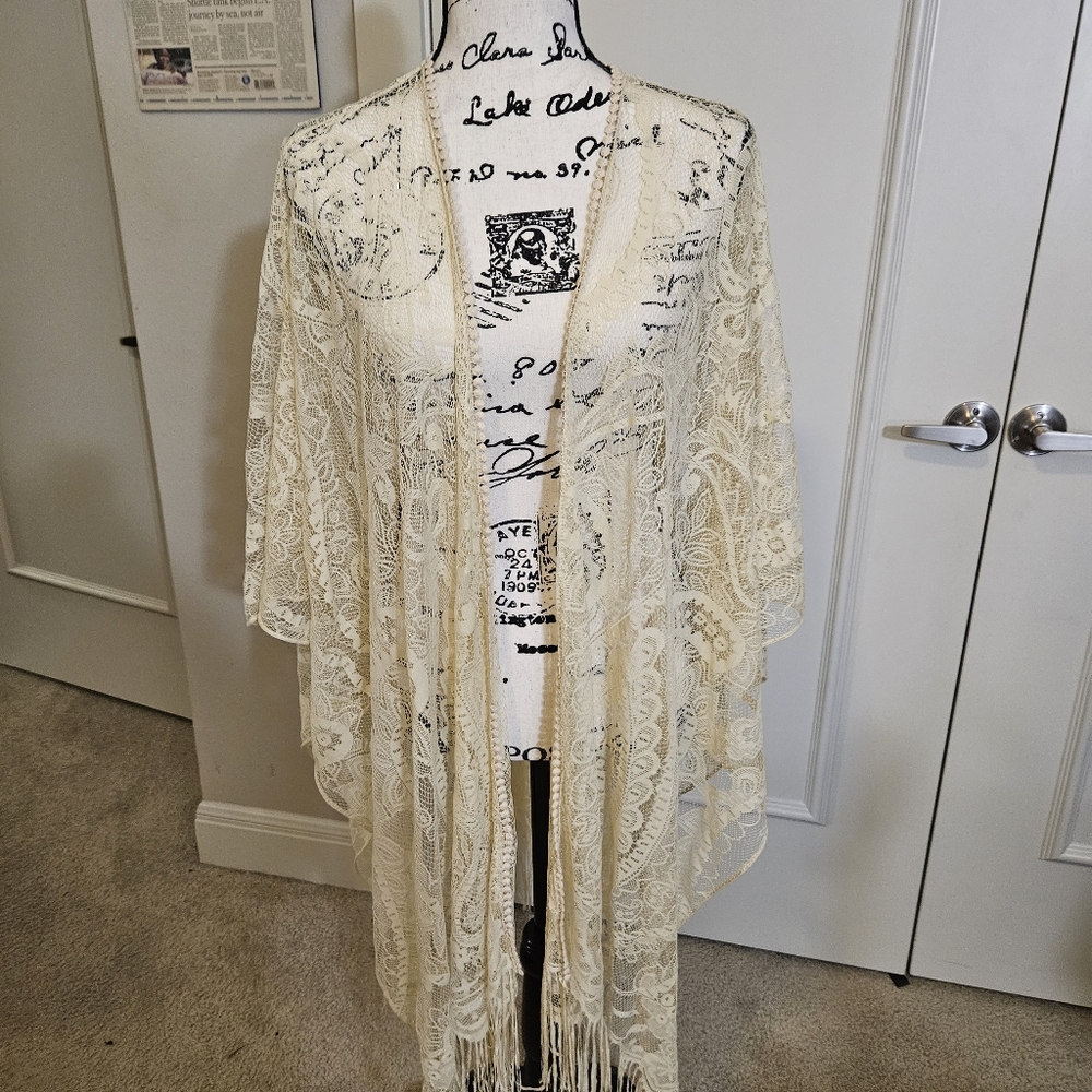 Torrid cream fringe ruana